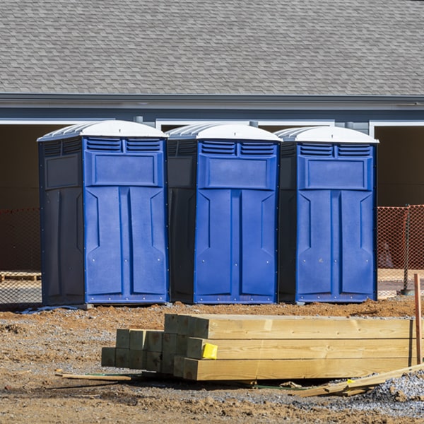 how often are the porta potties cleaned and serviced during a rental period in Carlton